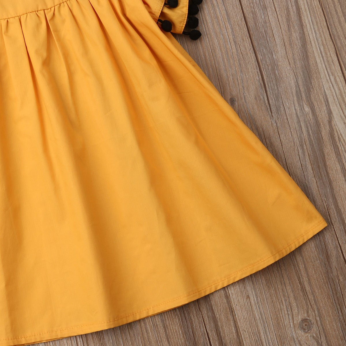 Baby Girl Ruffle Sleeve Cotton Dress with Pom Pom Trim